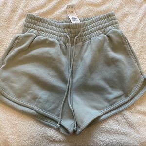 NWT Abercrombie dolphin hem light green shorts